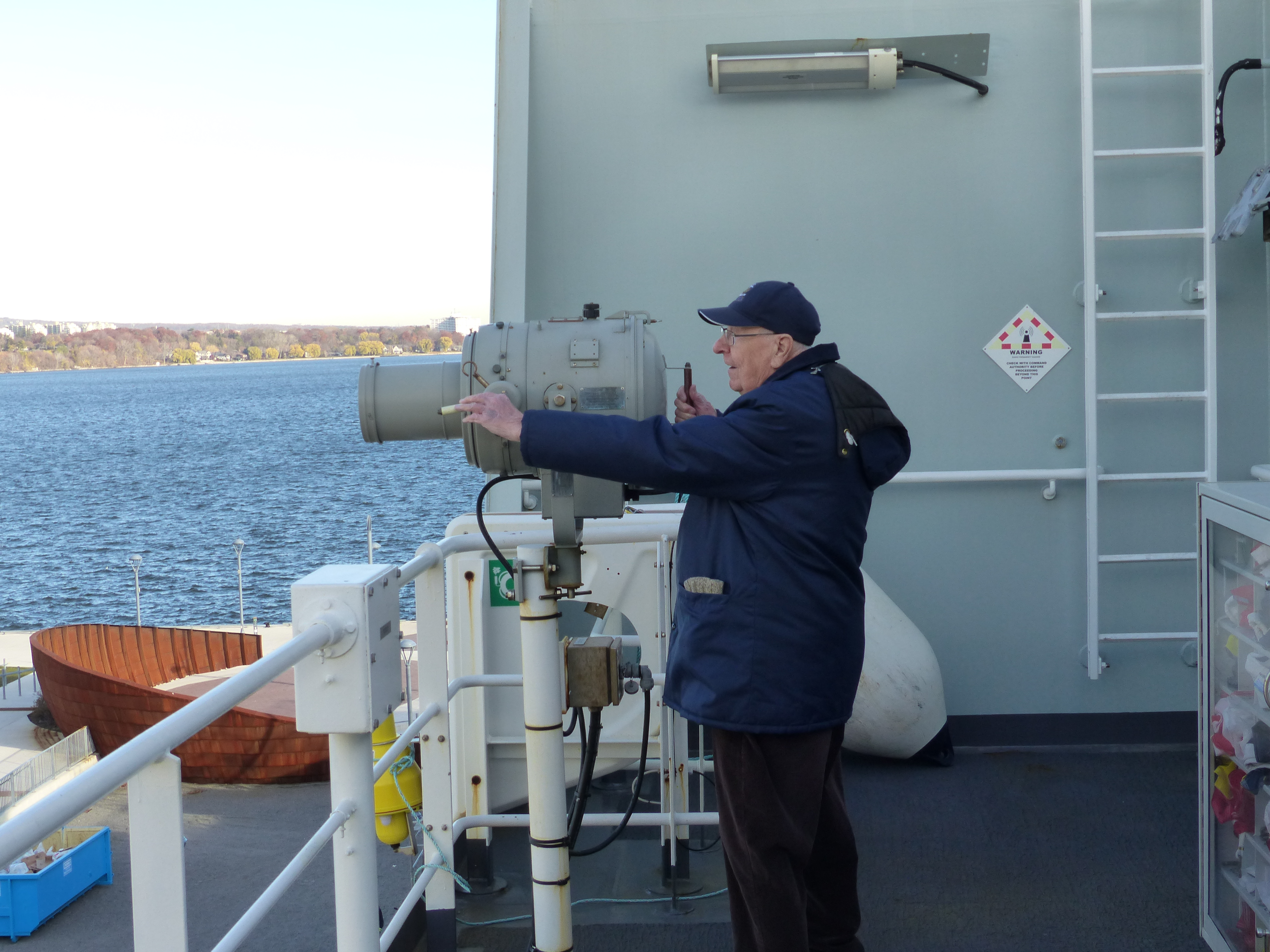 Andy Barber on the signals Deck- he raised the provincial ensign, and recovered the BONV ensign at the end of the cruise