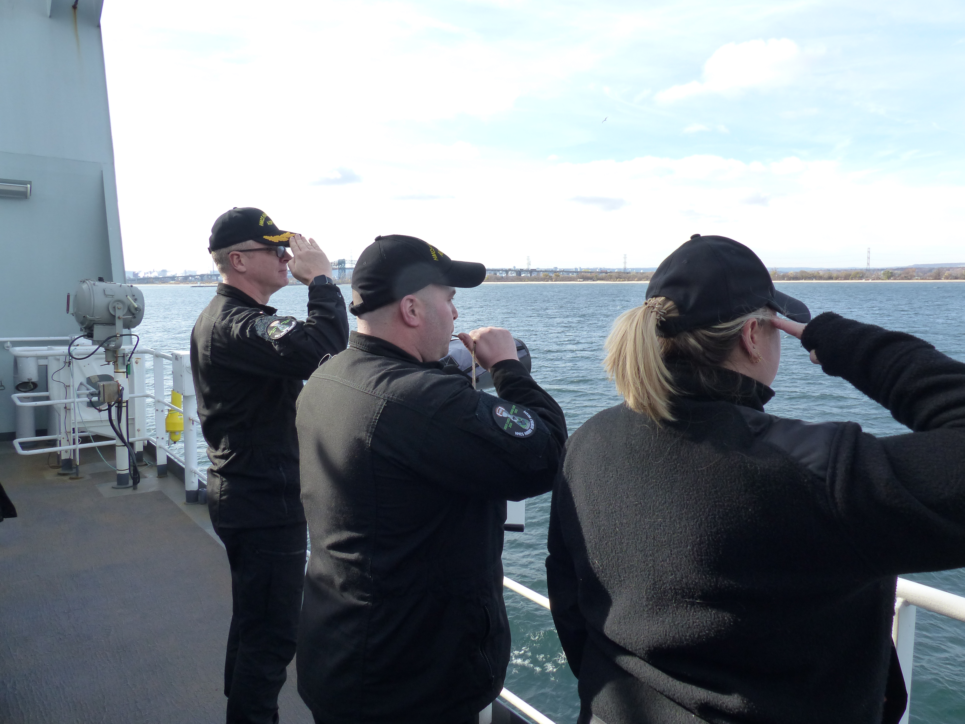 CDR Cote, Coxwain, XO saluting the Royal Canadian Ships Memorial in Spencer Smith Park