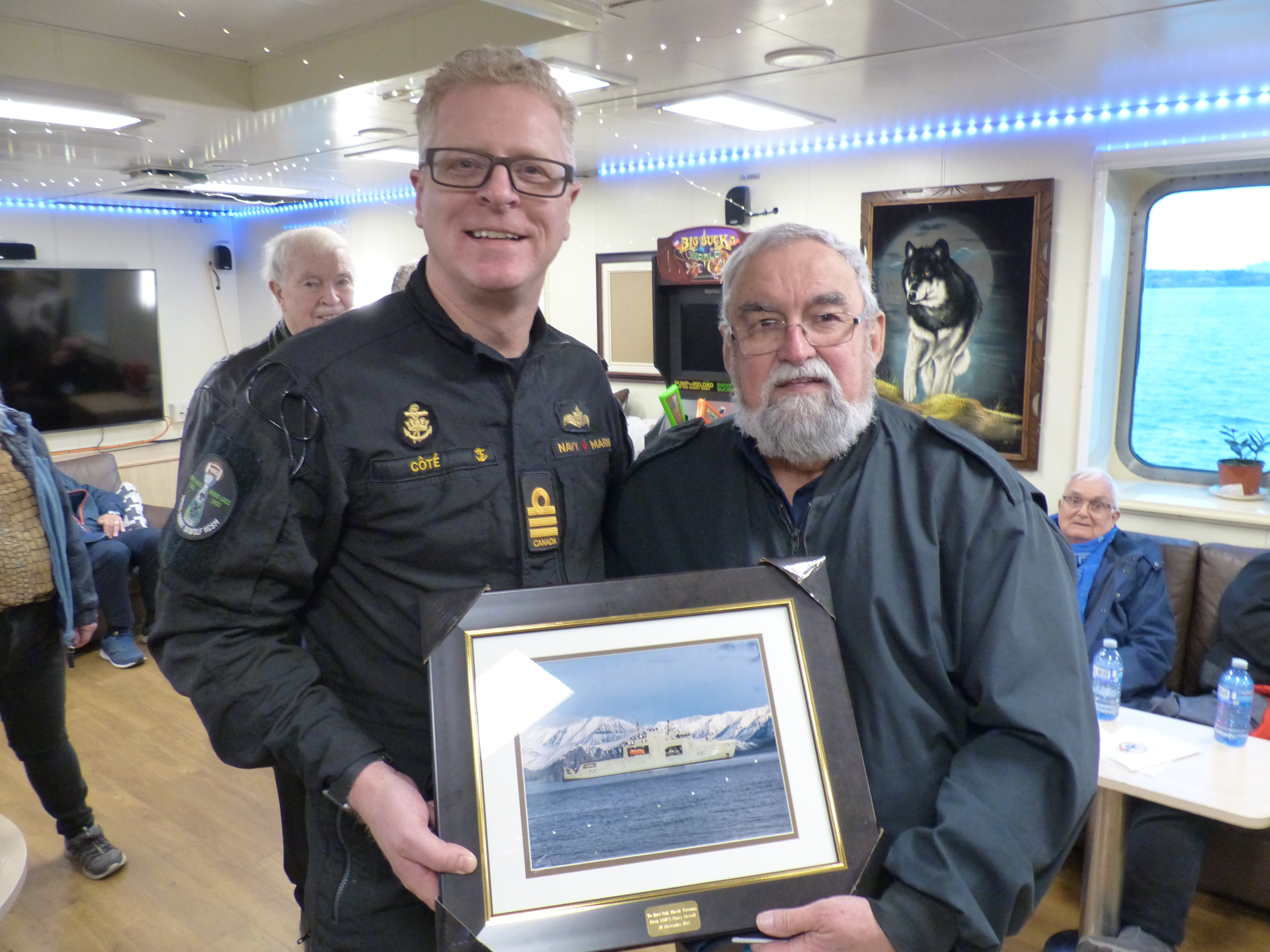 CDR Cote presents Picture of HMCS HARRY DEWOLFE to BONV received by Chairman Fred Norman